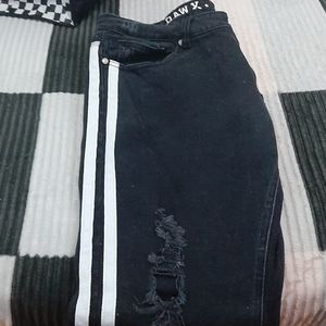 Black and white ripped Jean's.